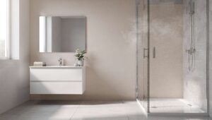 Nye vægpaneler klistres direkte på gamle fliser – selv i brusenichen: nyt bad på en weekend